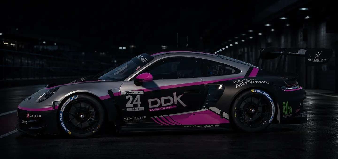 DDK Academy Porsche in a dark pit lane